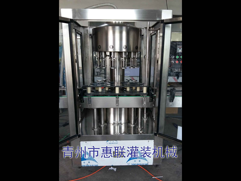 負(fù)壓灌裝機(jī) 負(fù)壓灌裝機(jī)